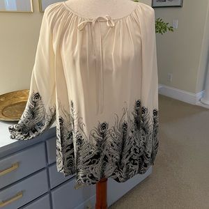 Woman’s blouse by Fifteen Twenty, size Medium.